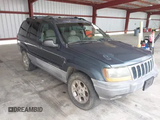 2001 Jeep Grand Cherokee Laredo z VIN 1J4GW48S61C517999, wystawiony jako IAAI lot #42246110 z przebiegiem 284 321 mil mil oraz . Historia ofert i sprzedaży dostępna na DreamBid. Obrazek 1.