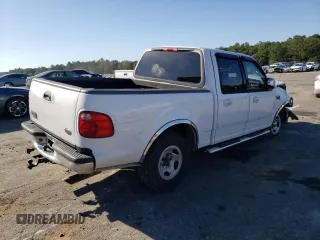 2002 Ford F-150 XLT with VIN 1FTRW07L42KB90527, listed as a Copart auction lot 85098244 with 143,213 mi miles and Salvage Title. Bid and sale history available at carsss.com. Image 3.
