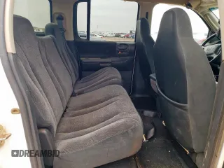 2001 Dodge Dakota Sport z VIN 1B7GL2AN51S118157, wystawiony jako Copart lot #58797325 z przebiegiem 147 765 mil mil oraz Szkoda całkowita • Salvage title. Historia ofert i sprzedaży dostępna na DreamBid. Obrazek 10.