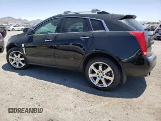2011 Cadillac SRX Premium Collection with VIN 3GYFNFEY6BS610097, listed as a Copart auction lot 60660235 with 138,616 mi miles and Salvage title. Bid and sale history available at DreamBid. Image 2.