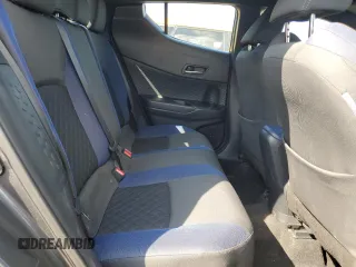 2021 Toyota C-HR LE z VIN NMTKHMBX1MR121205, wystawiony jako Copart lot #52317525 z przebiegiem 73 654 mil mil oraz Nie do naprawy. Historia ofert i sprzedaży dostępna na DreamBid. Obrazek 11.