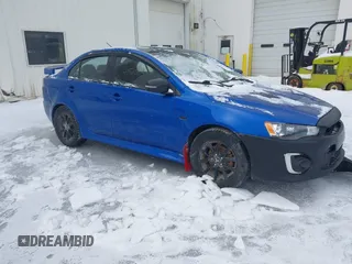 2017 Mitsubishi Lancer ES with VIN JA32U2FU7HU014242, listed as a IAAI auction lot 41575814 with 85,876 mi miles. Bid and sale history available at carsss.com. Image 1.