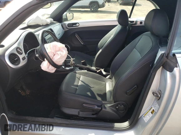 2013 Volkswagen Beetle 2.5L with VIN 3VW5P7AT0DM821280, listed as a Copart auction lot 53565635 with 94,969 mi miles and Salvage Title. Bid and sale history available at DreamBid. Image 7.