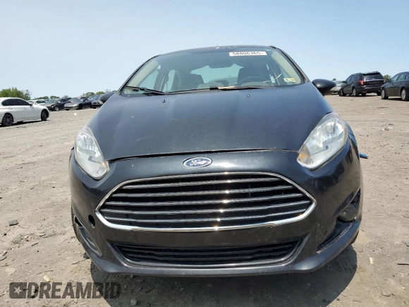 2014 Ford Fiesta SE z VIN 3FADP4BJ9EM176730, wystawiony jako Copart lot #58806365 z przebiegiem 93 814 mil mil oraz Szkoda całkowita • Salvage title. Historia ofert i sprzedaży dostępna na DreamBid. Obrazek 5.