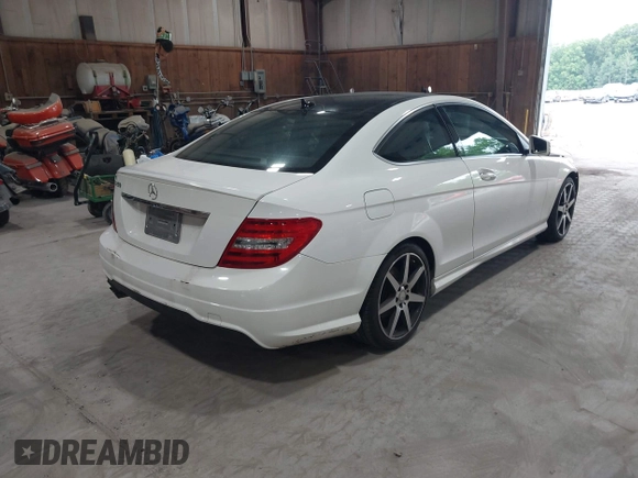 2015 Mercedes-Benz C 250 with VIN WDDGJ4HB5FG375879, listed as a IAAI auction lot 42454524 with 50,588 mi miles and . Bid and sale history available at DreamBid. Image 4.