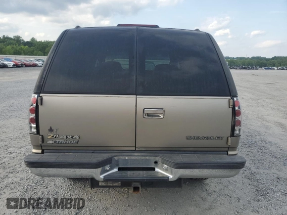 2000 Chevrolet Tahoe Z71 with VIN 1GNEK13R7YR189177, listed as a Copart auction lot 56830725 with 308,270 mi miles and Salvage title. Bid and sale history available at DreamBid. Image 6.