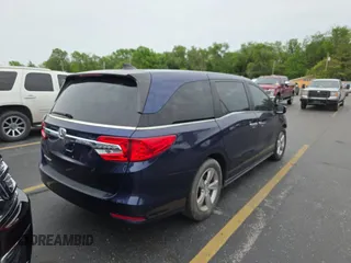 2018 Honda Odyssey EX-L with VIN 5FNRL6H75JB064377, listed as a Copart auction lot 56241905 with 103,651 mi miles and Clean Title. Bid and sale history available at DreamBid. Image 4.