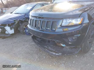 2015 Jeep Grand Cherokee Altitude with VIN 1C4RJFAG6FC796571, listed as a IAAI auction lot 41258471 with 104,049 mi miles. Bid and sale history available at carsss.com. Image 6.