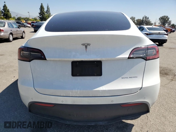 2022 Tesla Model Y Long Range with VIN 7SAYGDEE8NF551850, listed as a Copart auction lot 52747195 with 62,340 mi miles and Salvage Title. Bid and sale history available at carsss.com. Image 6.
