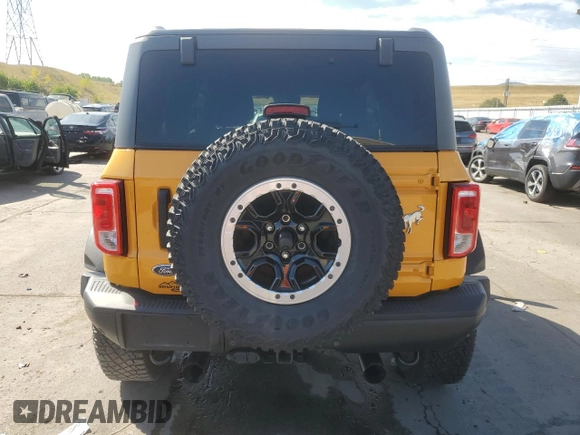 2021 Ford Bronco with VIN 1FMDE5CPXMLB06562, listed as a Copart auction lot 73561084 with 33,154 mi miles and Salvage title. Bid and sale history available at DreamBid. Image 6.