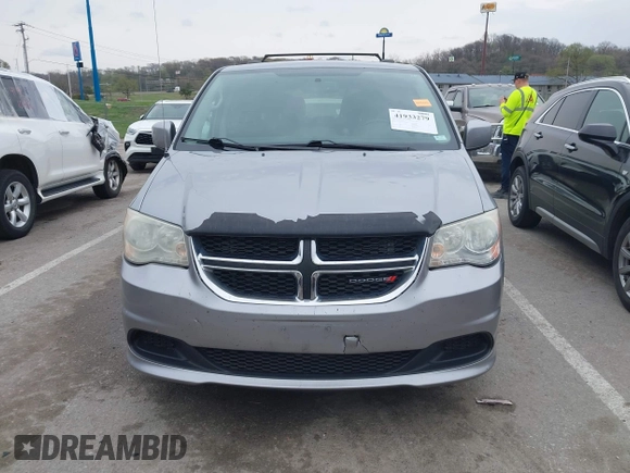 2014 Dodge Grand Caravan SXT with VIN 2C4RDGCG0ER417662, listed as a IAAI auction lot 41933279 with 156,751 mi miles and . Bid and sale history available at DreamBid. Image 12.