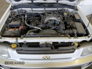 2000 Infiniti QX4 z VIN JNRAR07Y3YW084474, wystawiony jako Copart lot #87089994 z przebiegiem 237 974 mil mil oraz Szkody całkowita. Historia ofert i sprzedaży dostępna na DreamBid. Obrazek 13.
