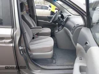 2010 Kia Sedona LX with VIN KNDMG4C30A6329449, listed as a IAAI auction lot 41946489 with 202,881 mi miles. Bid and sale history available at carsss.com. Image 5.