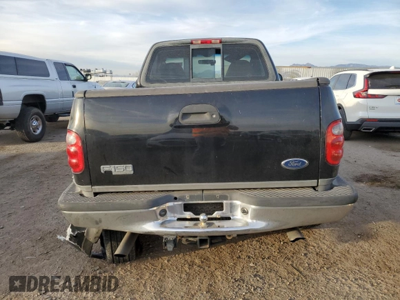 2004 Ford F-150 with VIN 2FTRF08W74CA53629, listed as a Copart auction lot 87326734 with 229,631 mi miles and Salvage title. Bid and sale history available at DreamBid. Image 6.