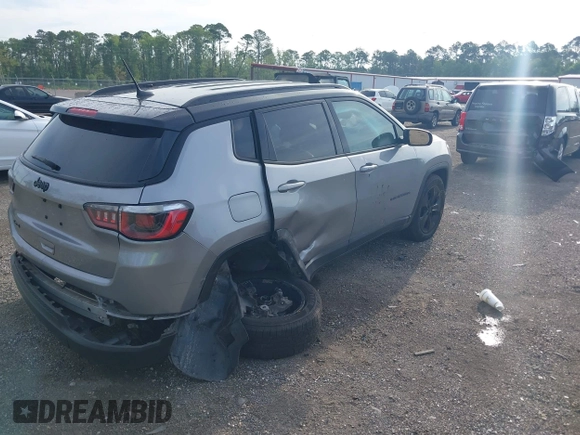 2018 Jeep Compass Latitude with VIN 3C4NJDBBXJT402489, listed as a IAAI auction lot 42369108 with 126,939 mi miles and . Bid and sale history available at DreamBid. Image 4.