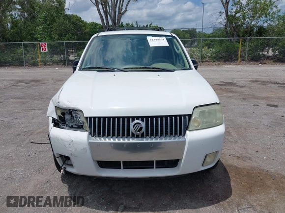 2006 Mercury Mariner Luxury with VIN 4M2YU56116KJ14472, listed as a IAAI auction lot 42349564 with 96,221 mi miles and . Bid and sale history available at DreamBid. Image 12.