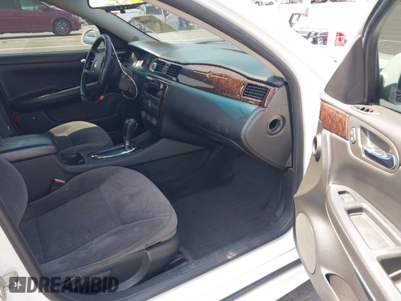 2014 Chevrolet Impala LT with VIN 2G1WB5E34E1101292, listed as a IAAI auction lot 42487680 with 273,654 mi miles and . Bid and sale history available at DreamBid. Image 5.