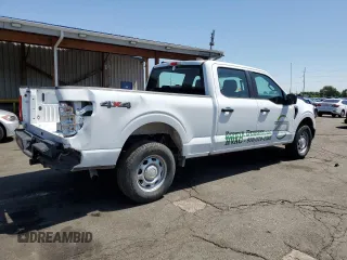 2023 Ford F-150 XL with VIN 1FTFW1E89PKD98613, listed as a Copart auction lot 61860785 with 25,568 mi miles and Salvage title. Bid and sale history available at DreamBid. Image 3.