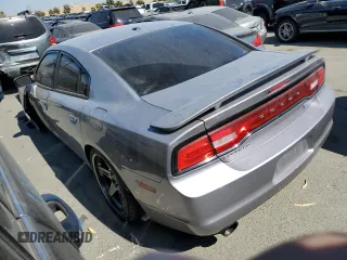 2014 Dodge Charger RT Plus with VIN 2C3CDXCT4EH307940, listed as a Copart auction lot 64035484 with 129,665 mi miles and Salvage Title. Bid and sale history available at carsss.com. Image 2.
