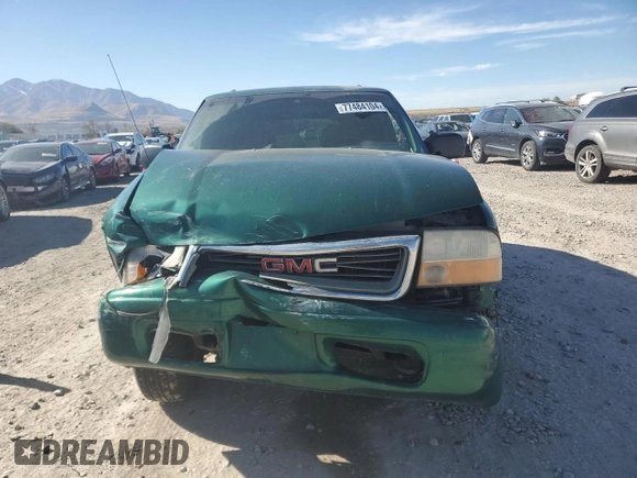 2000 GMC Jimmy SLE Convenience z VIN 1GKDT13W3Y2215035, wystawiony jako Copart lot #77484104 z przebiegiem 116 124 mil mil oraz Szkoda całkowita • Salvage title. Historia ofert i sprzedaży dostępna na DreamBid. Obrazek 5.