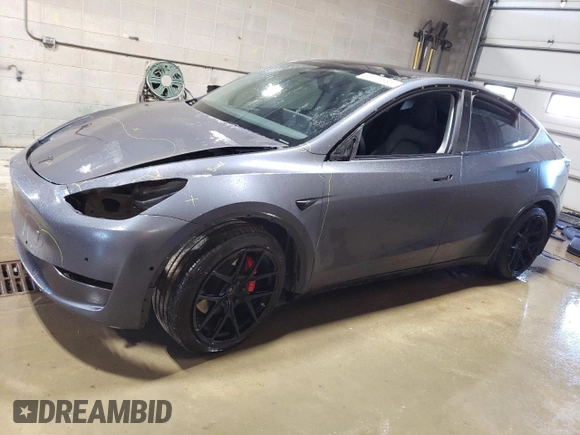 2021 Tesla Model Y Performance with VIN 5YJYGDEF2MF134700, listed as a Copart auction lot 56325685 with 66,730 mi miles and Salvage Title. Bid and sale history available at DreamBid. Image 1.