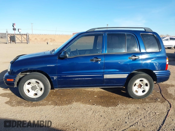 2003 Suzuki Vitara z VIN 2S3TE52V436101091, wystawiony jako IAAI lot #41472279 z przebiegiem 163 429 mil mil oraz . Historia ofert i sprzedaży dostępna na DreamBid. Obrazek 14.