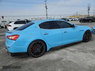 2014 Maserati Ghibli S Q4 with VIN ZAM57RTA7E1089301, listed as a Copart auction lot 69271994 with 58,318 mi miles and Salvage Title. Bid and sale history available at carsss.com. Image 3.