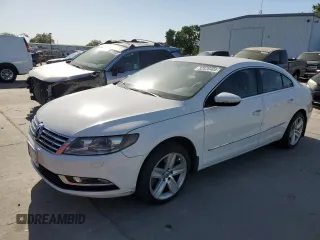 2014 Volkswagen CC R-Line z VIN WVWBP7AN8EE502398, wystawiony jako Copart lot #52826405 z przebiegiem 121 799 mil mil oraz Szkoda całkowita • Salvage title. Historia ofert i sprzedaży dostępna na DreamBid. Obrazek 1.