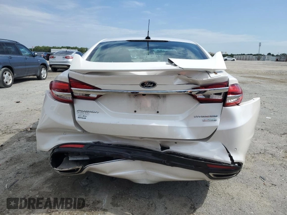 2017 Ford Fusion Titanium с VIN 3FA6P0K96HR161679, выставлен на аукционе Copart как лот 61237935 с пробегом 66 680 миль миль и Списание • Salvage title. История ставок и продаж доступна на DreamBid. Изображение 6.