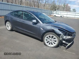 2022 Tesla Model 3 Long Range with VIN 5YJ3E1EBXNF188596, listed as a Copart auction lot 51846915 with 49,271 mi miles and Non Repairable. Bid and sale history available at carsss.com. Image 4.