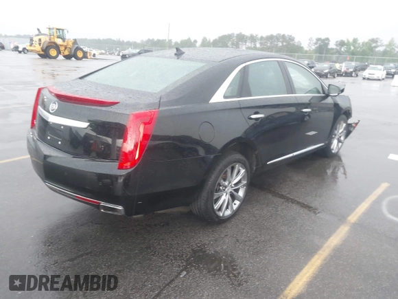 2013 Cadillac XTS Premium z VIN 2G61S5S39D9112491, wystawiony jako IAAI lot #42216373 z przebiegiem 145 338 mil mil oraz . Historia ofert i sprzedaży dostępna na DreamBid. Obrazek 4.
