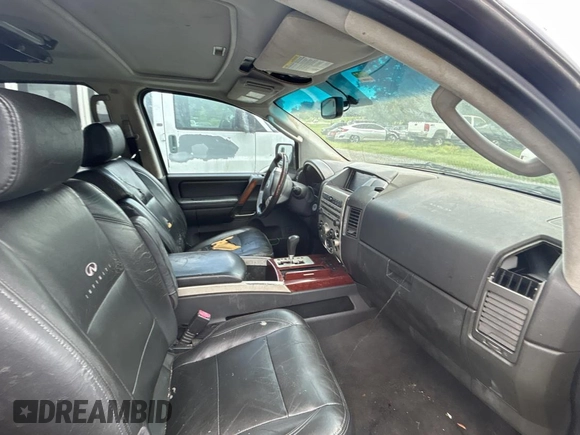 2007 Infiniti QX56 z VIN 5N3AA08A47N804400, wystawiony jako Copart lot #59031335 z przebiegiem 202 776 mil mil oraz Czysty tytuł • Clean title. Historia ofert i sprzedaży dostępna na DreamBid. Obrazek 5.