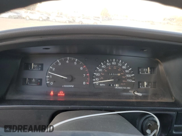 1991 Toyota Pickup DX z VIN JT4RN01P5M0011747, wystawiony jako Copart lot #42169245 z przebiegiem 204 202 mil mil oraz Szkoda całkowita • Salvage title. Historia ofert i sprzedaży dostępna na DreamBid. Obrazek 9.
