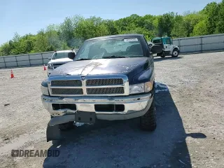 2001 Dodge 2500 with VIN 1B7KF23Z81J581286, listed as a Copart auction lot 54329385 with 148,859 mi miles and Salvage title. Bid and sale history available at DreamBid. Image 13.