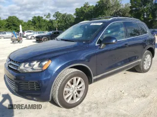 2014 Volkswagen Touareg Sport with VIN WVGEF9BP0ED005648, listed as a Copart auction lot 53230315 with 188,103 mi miles and Clean Title. Bid and sale history available at DreamBid. Image 1.