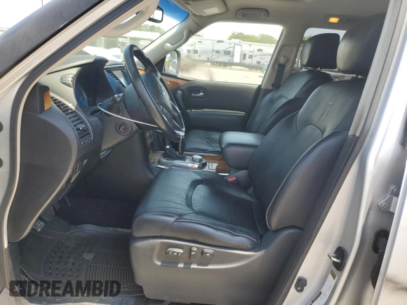 2014 Infiniti QX80 with VIN JN8AZ2NC3E9351193, listed as a Copart auction lot 58953585 with 182,686 mi miles and Salvage title. Bid and sale history available at DreamBid. Image 7.