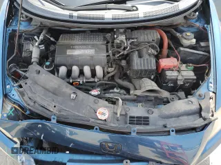 2011 Honda CR-Z z VIN JHMZF1D45BS000400, wystawiony jako Copart lot #60103325 z przebiegiem 164 556 mil mil oraz Szkoda całkowita • Salvage title. Historia ofert i sprzedaży dostępna na DreamBid. Obrazek 11.