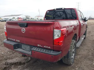 2017 Nissan Titan XD PRO-4X with VIN 1N6BA1F41HN570333, listed as a IAAI auction lot 41741250 with 62,948 mi miles. Bid and sale history available at carsss.com. Image 4.