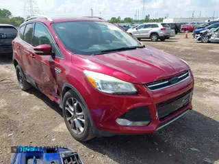 2015 Ford Escape Titanium z VIN 1FMCU9J91FUC58933, wystawiony jako IAAI lot #42583736 z przebiegiem 147 359 mil mil oraz . Historia ofert i sprzedaży dostępna na DreamBid. Obrazek 1.