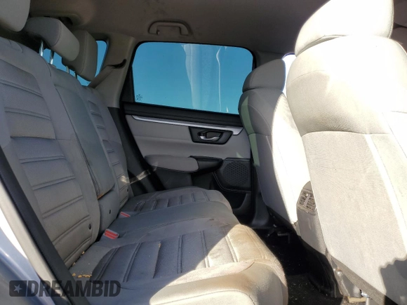 2018 Honda CR-V LX z VIN 2HKRW6H3XJH203604, wystawiony jako Copart lot #89002705 z przebiegiem 77 628 mil mil oraz Szkoda całkowita • Salvage title. Historia ofert i sprzedaży dostępna na DreamBid. Obrazek 11.