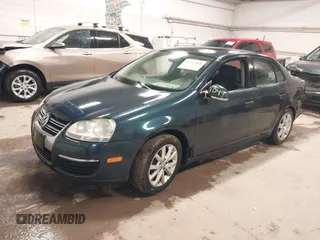 2009 Volkswagen Jetta z VIN 3VWHZ71K79M020139, wystawiony jako IAAI lot #42292767 z przebiegiem 156 619 mil mil oraz . Historia ofert i sprzedaży dostępna na DreamBid. Obrazek 2.