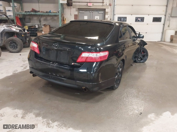 2009 Toyota Camry LE with VIN 4T1BK46K09U589927, listed as a IAAI auction lot 41823383 with 220,589 mi miles. Bid and sale history available at carsss.com. Image 4.