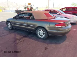 2001 Chrysler Sebring LXi z VIN 1C3EL55U61N638770, wystawiony jako IAAI lot #42228671 z przebiegiem 87 579 mil mil oraz . Historia ofert i sprzedaży dostępna na DreamBid. Obrazek 3.