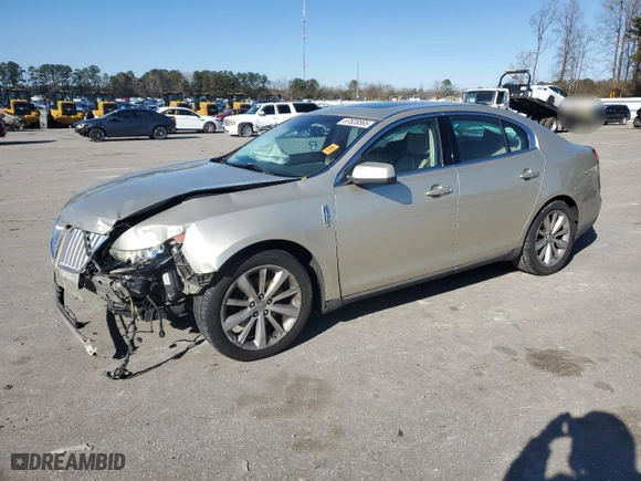 2011 Lincoln MKS w/EcoBoost with VIN 1LNHL9FTXBG604676, listed as a Copart auction lot 87628565 with 214373 miles and Salvage Title. Bid and sale history available at carsss.com. Image 1.