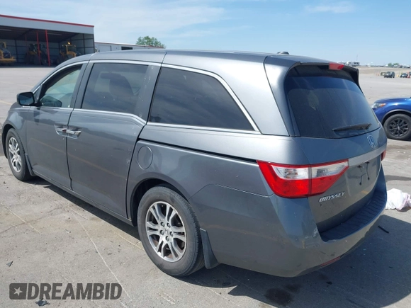 2011 Honda Odyssey EX-L with VIN 5FNRL5H69BB092752, listed as a IAAI auction lot 42245534 with 142,718 mi miles and . Bid and sale history available at DreamBid. Image 3.