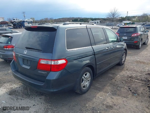 2005 Honda Odyssey EX-L with VIN 5FNRL38765B070922, listed as a IAAI auction lot 41868648 with 192,518 mi miles. Bid and sale history available at carsss.com. Image 4.