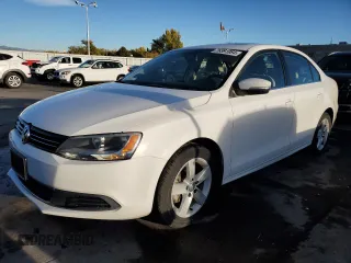 2014 Volkswagen Jetta TDI w/Premium с VIN 3VW3L7AJ4EM390185, выставлен на аукционе Copart как лот 76391084 с пробегом 49 897 миль миль и Списание • Salvage title. История ставок и продаж доступна на DreamBid. Изображение 1.