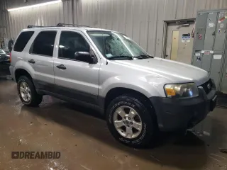 2005 Ford Escape XLT z VIN 1FMYU93145KA20050, wystawiony jako Copart lot #76794024 z przebiegiem 98 559 mil mil oraz Szkoda całkowita • Salvage title. Historia ofert i sprzedaży dostępna na DreamBid. Obrazek 4.