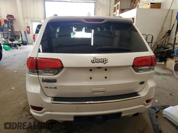 2017 Jeep Grand Cherokee Overland z VIN 1C4RJFCG8HC809868, wystawiony jako Copart lot #64056155 z przebiegiem 54 136 mil mil oraz Szkoda całkowita • Salvage title. Historia ofert i sprzedaży dostępna na DreamBid. Obrazek 6.