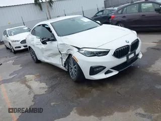 2021 BMW 2 Series 228i with VIN WBA53AK01M7J12347, listed as a IAAI auction lot 42432565 with 52,559 mi miles and . Bid and sale history available at DreamBid. Image 1.